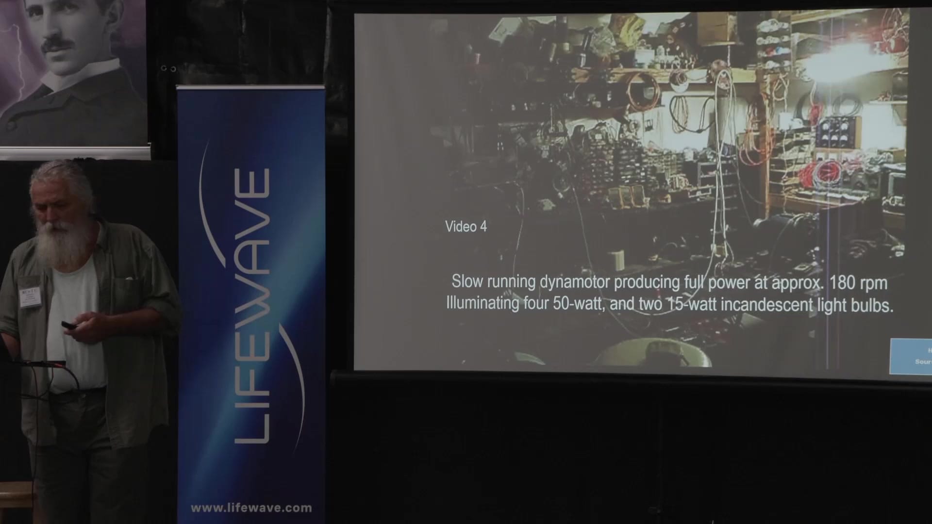 Video slide: the slow-running dynamotor producing full power at approximately 180 rpm, lighting incandescent bulbs