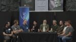 The 2026 ESTC presenters seated on stage for the closing open Q and A, moderated by Aaron Murakami